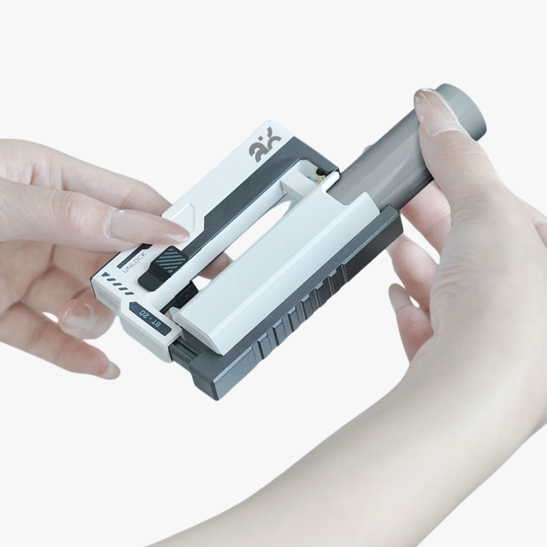 Handheld device with a white and gray design held by two hands on a white background