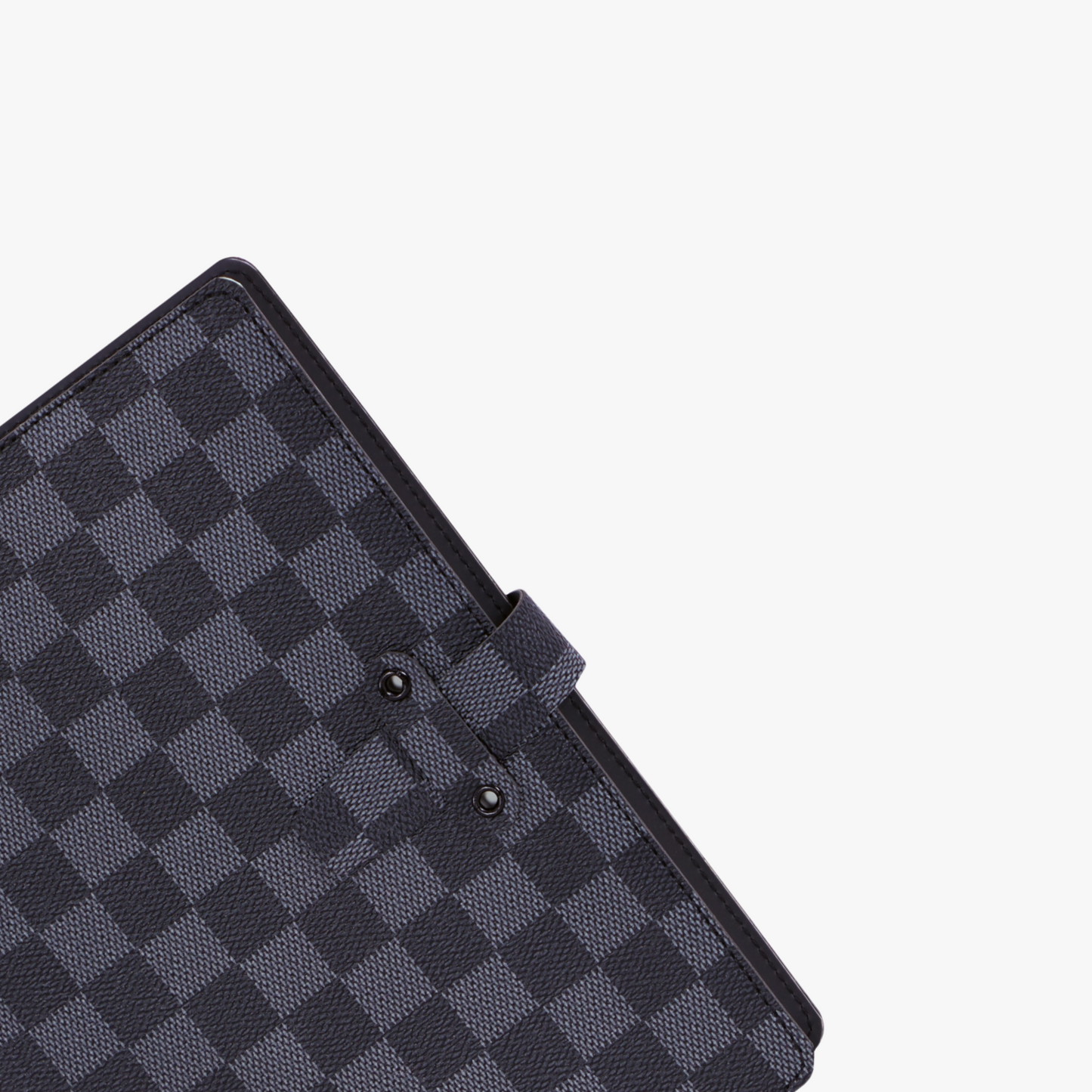 Black checkered tablet case on a light gray background
