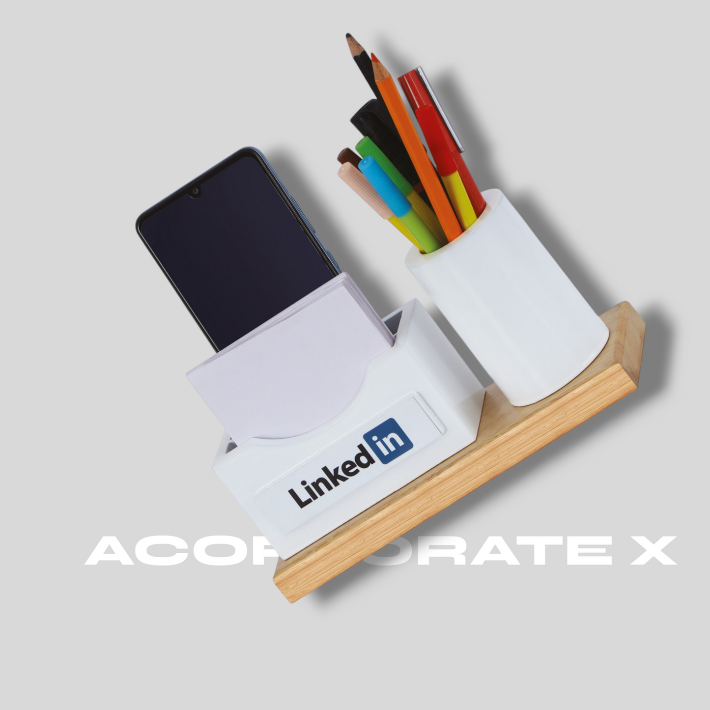 Wooden custom desk organizer with pen stand, phone holder, and logo branding – ideal for office use and gifting.