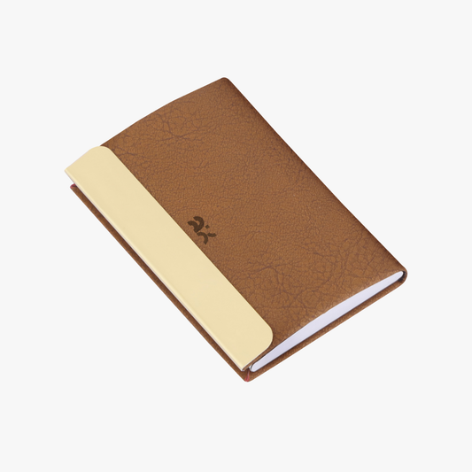 Brown notebook with a beige interior on a white background