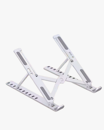A silver laptop stand made of aluminum with a simple, flat design.