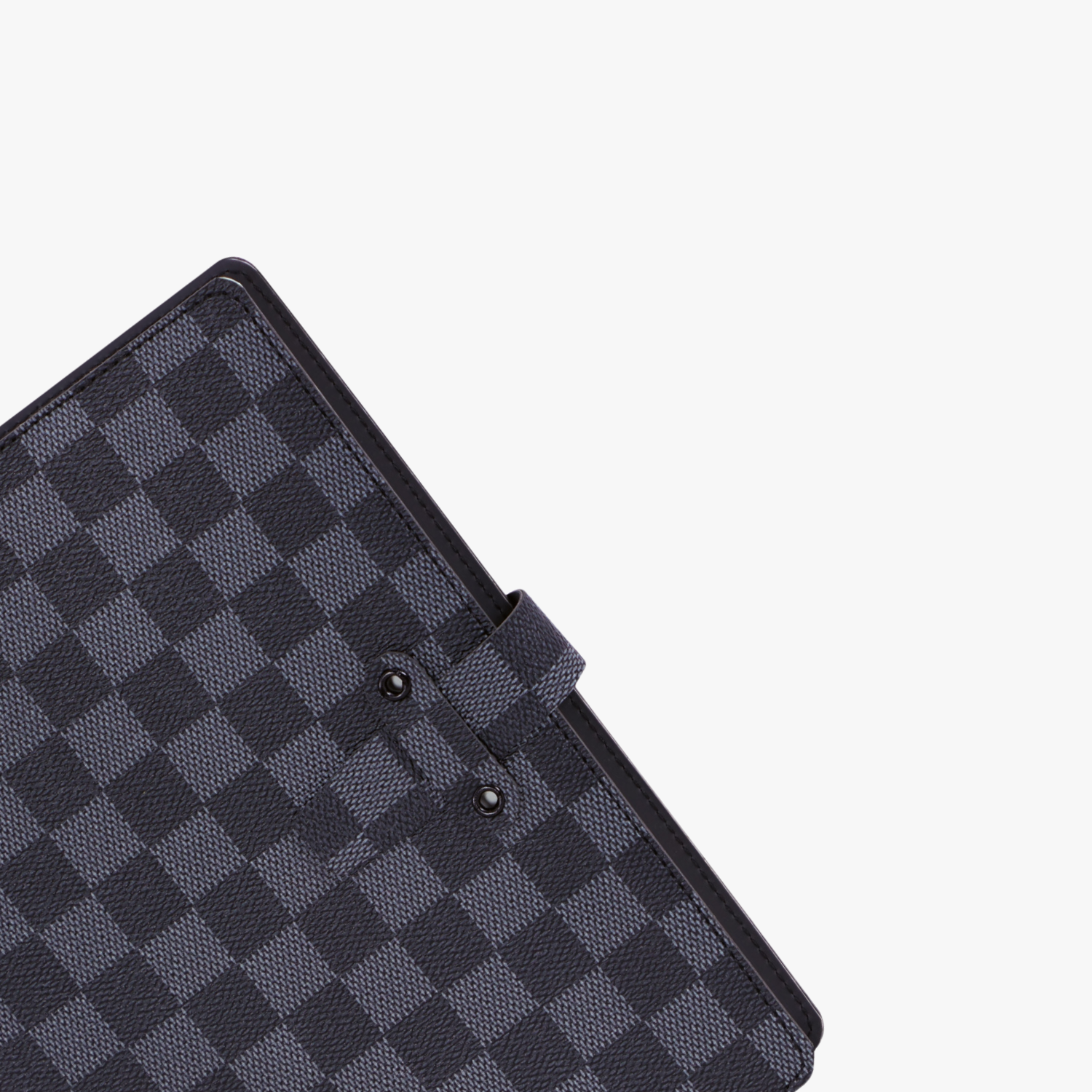 Black checkered tablet case on a light gray background