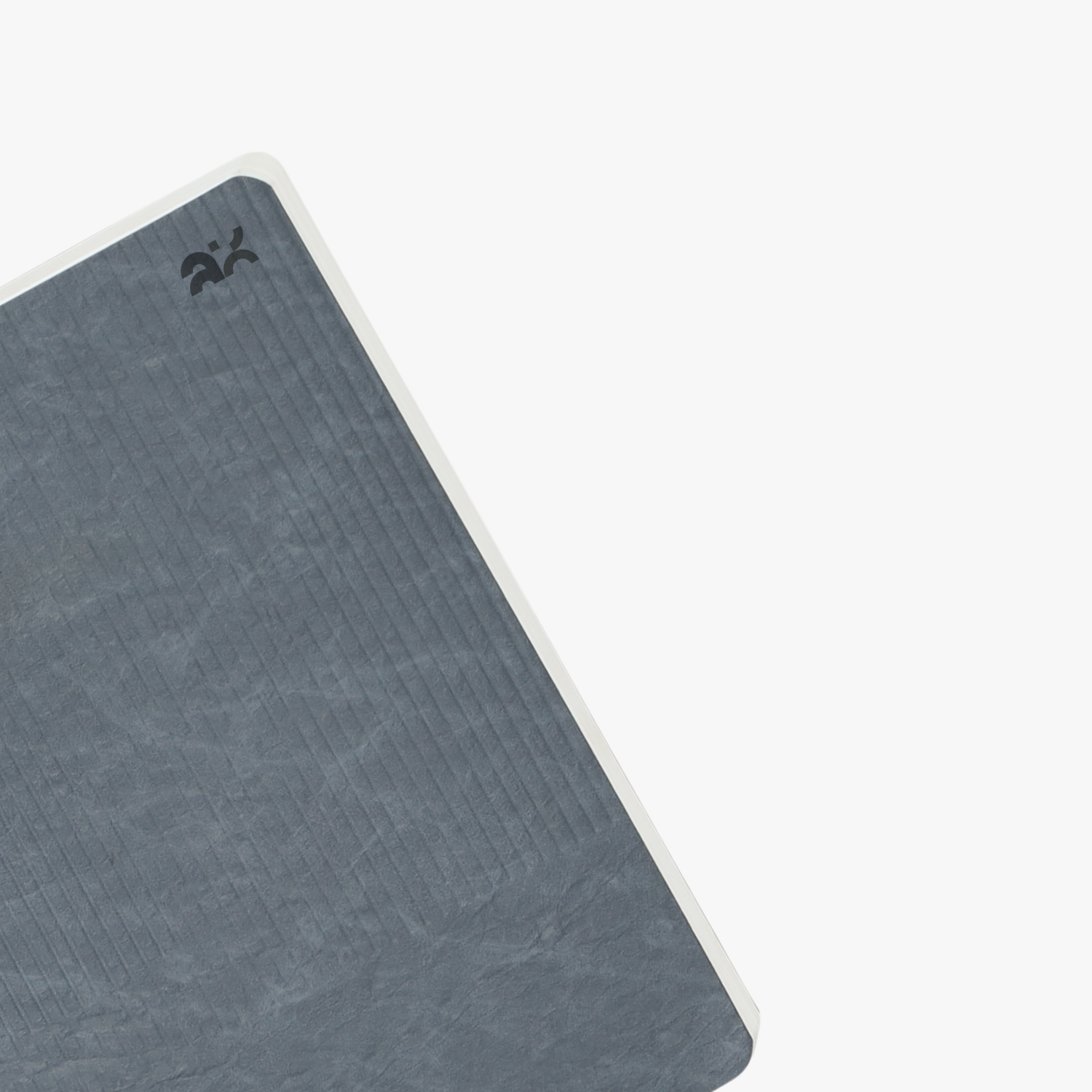 Gray textured mat with a brand logo on a white background