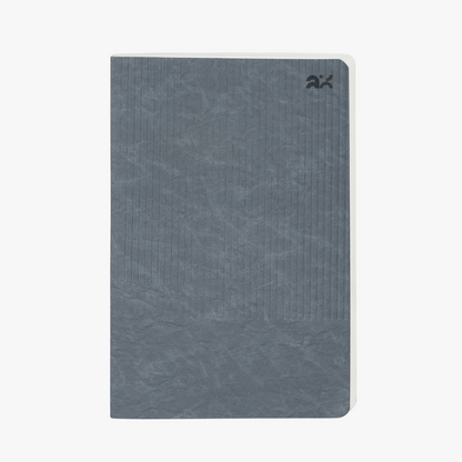 Gray notebook with a textured cover on a white background